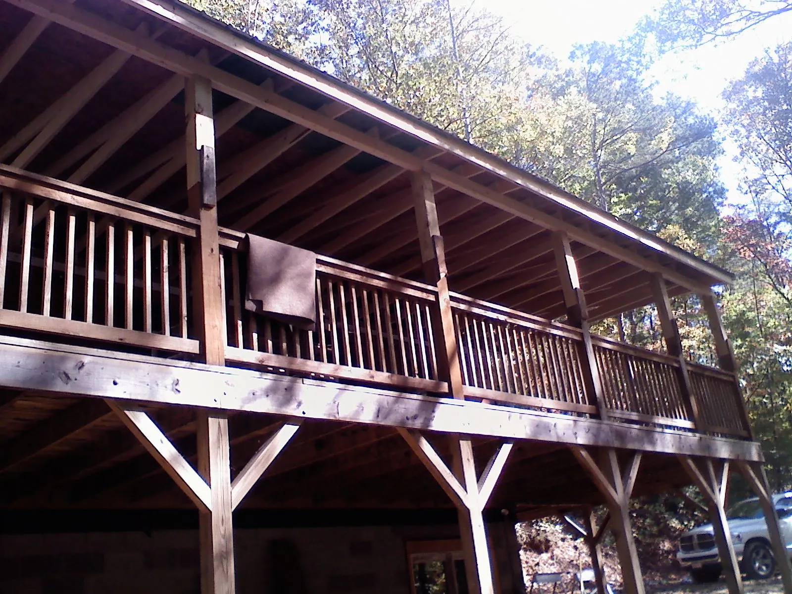 Timber framing under a new elevated porch and deck — Roof Leak Repair in Woodmere by Roofing Brothers